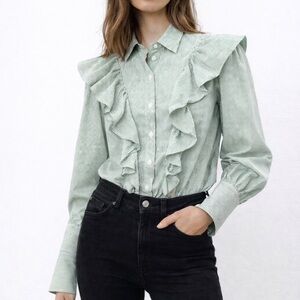 Petersyn green and white striped ruffled blouse